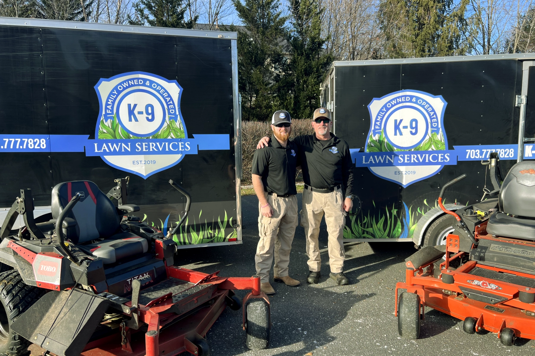 Hunter and Mike with trailers and mowers